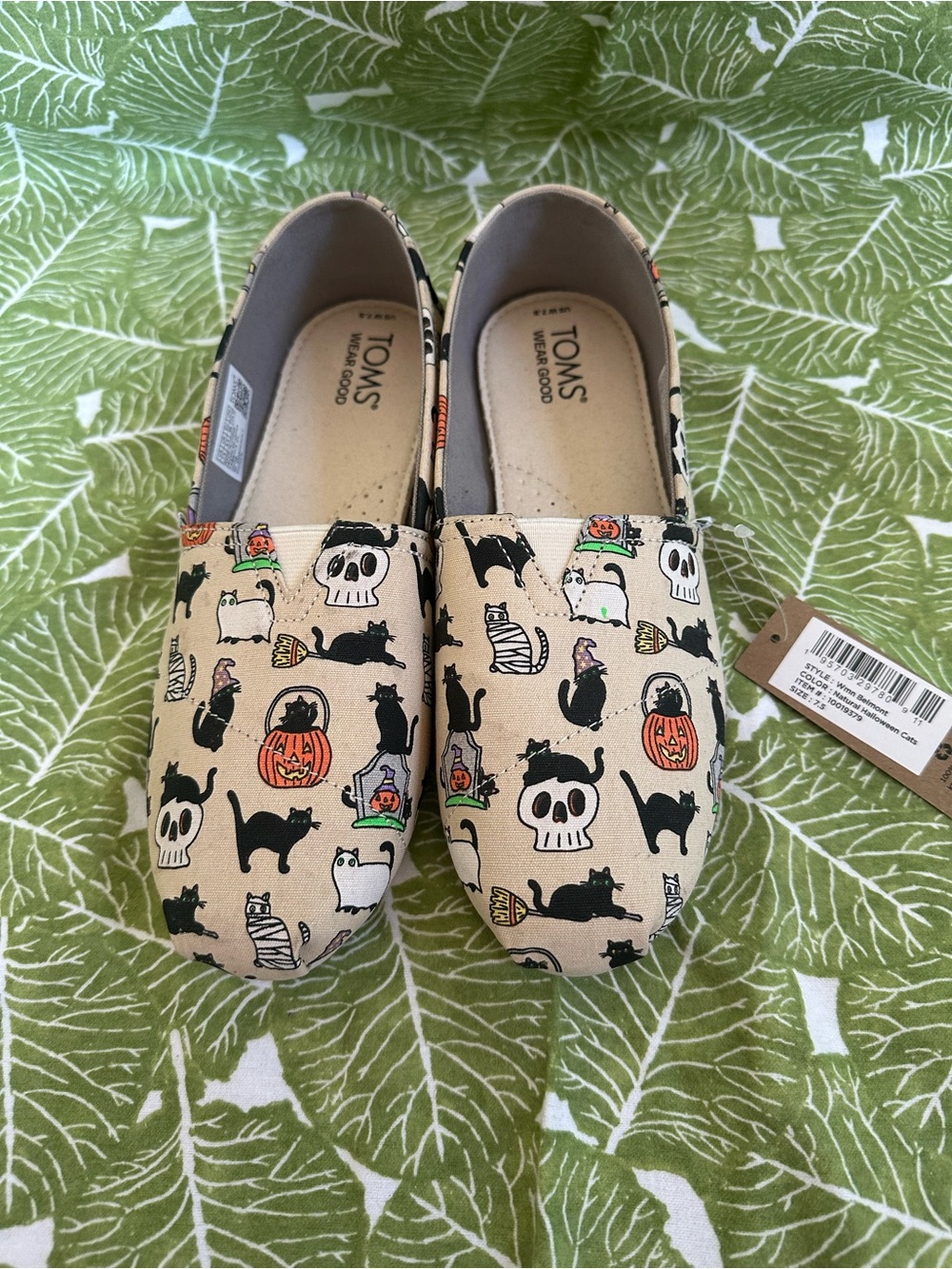 TOMS women’s  Halloween Cat & Pumpkin Canvas Slip-Ons - Beige